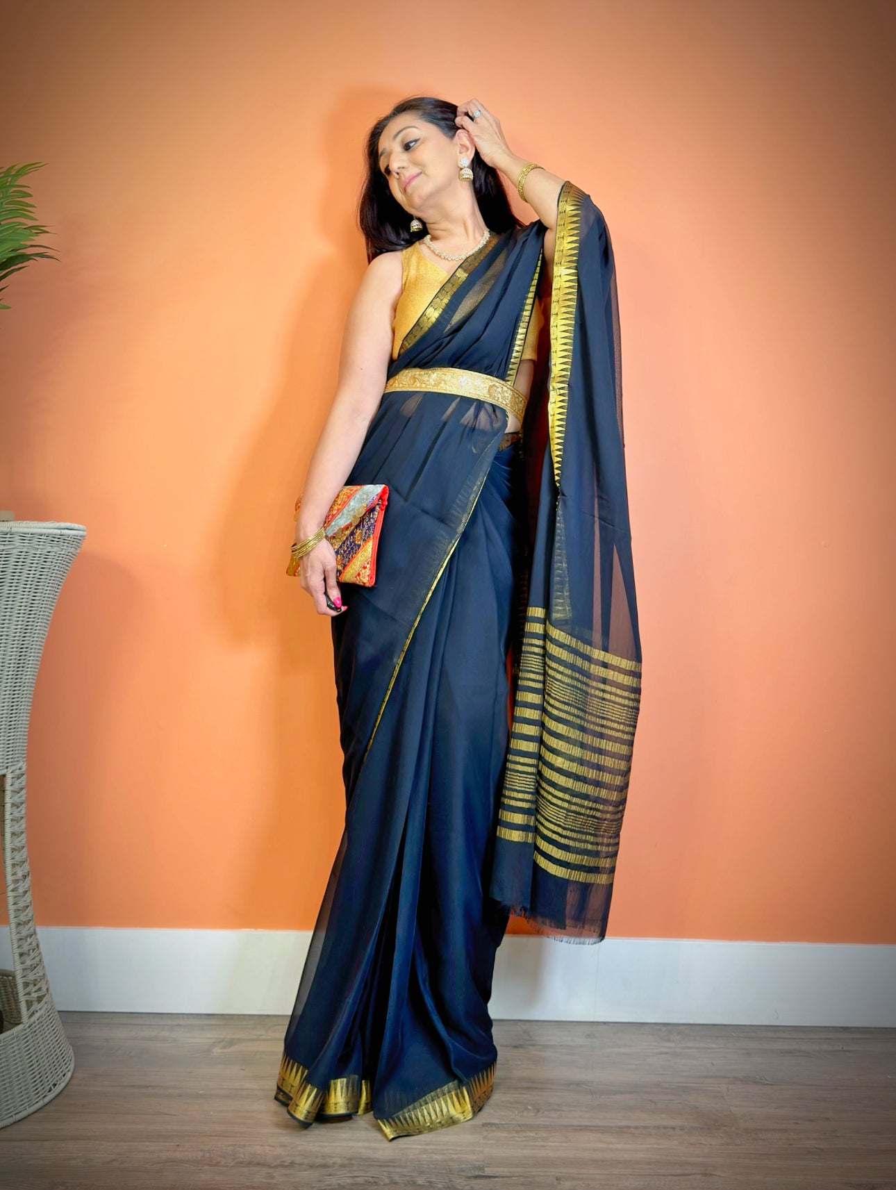 Chic Minimalism: Semi-Chiffon Plain Saree with Gold border - Femantraa