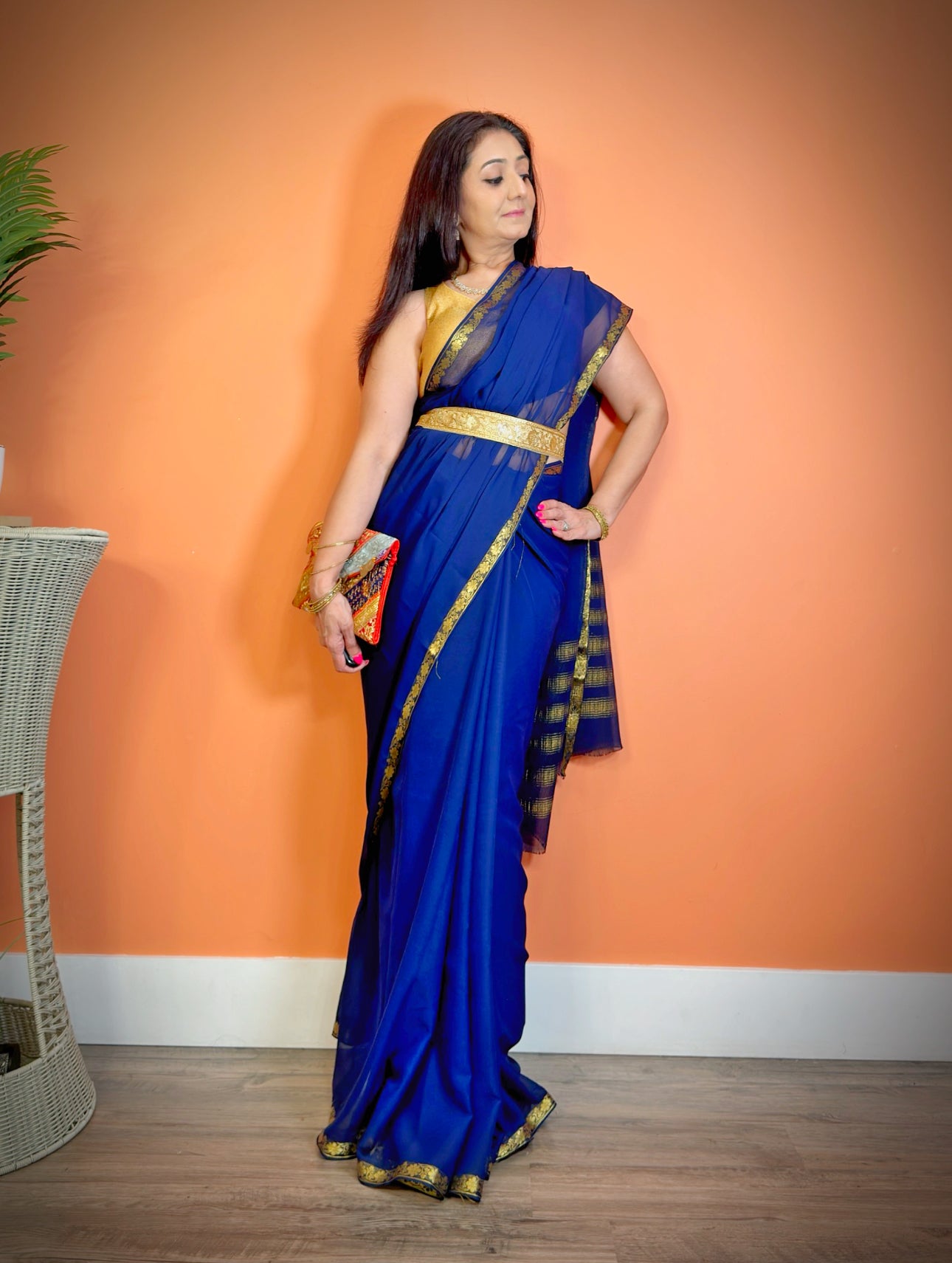 Chic Minimalism: Semi-Chiffon Plain Saree with Gold border - Femantraa