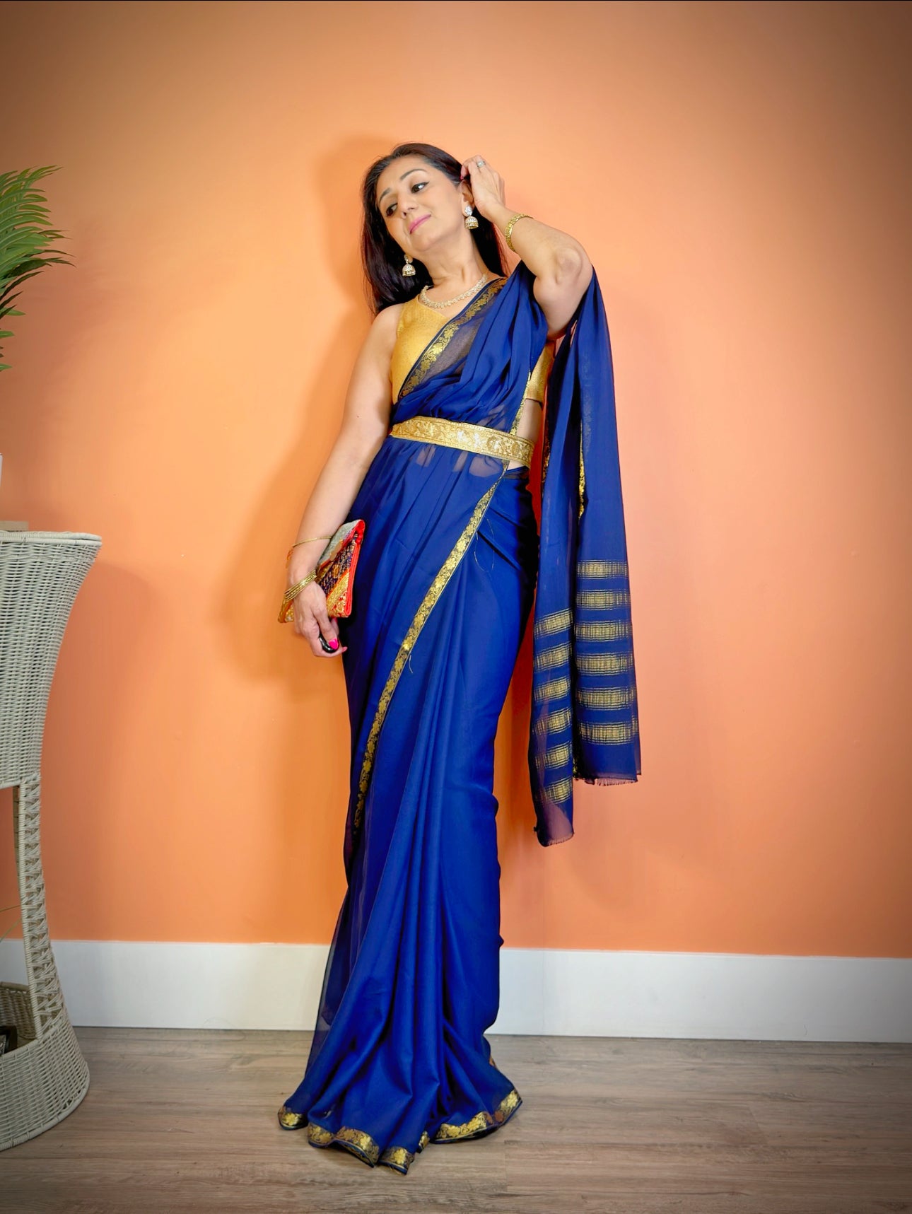 Chic Minimalism: Semi-Chiffon Plain Saree with Gold border - Femantraa